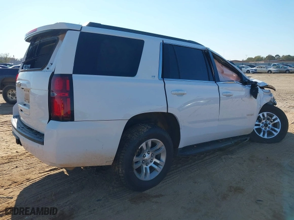 2020 Chevrolet Tahoe LT with VIN 1GNSKBKC1LR264762, listed as a IAAI auction lot 41037026 with 95,644 mi miles. Bid and sale history available at carsss.com. Image 4.