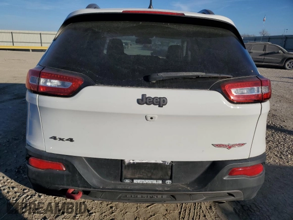 2016 Jeep Cherokee Trailhawk z VIN 1C4PJMBS2GW334801, wystawiony jako Copart lot #87434324 z przebiegiem 92 887 mil mil oraz Szkoda całkowita • Salvage title. Historia ofert i sprzedaży dostępna na DreamBid. Obrazek 6.
