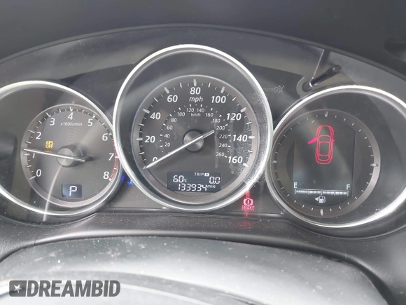 2014 Mazda CX-5 Grand Touring with VIN JM3KE2DY1E0307911, listed as a IAAI auction lot 42064898 with 133,934 mi miles. Bid and sale history available at carsss.com. Image 7.