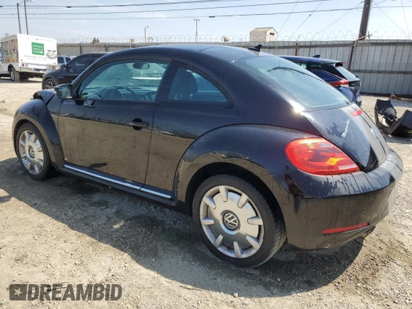 2012 Volkswagen Beetle 2.5L w/Sound/Nav PZEV with VIN 3VWJP7AT7CM646779, listed as a Copart auction lot 53756265 with 116,662 mi miles and Salvage Title. Bid and sale history available at DreamBid. Image 2.