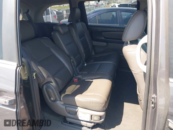 2013 Honda Odyssey EX-L with VIN 5FNRL5H65DB011071, listed as a IAAI auction lot 41992265 with 192,624 mi miles and . Bid and sale history available at DreamBid. Image 8.