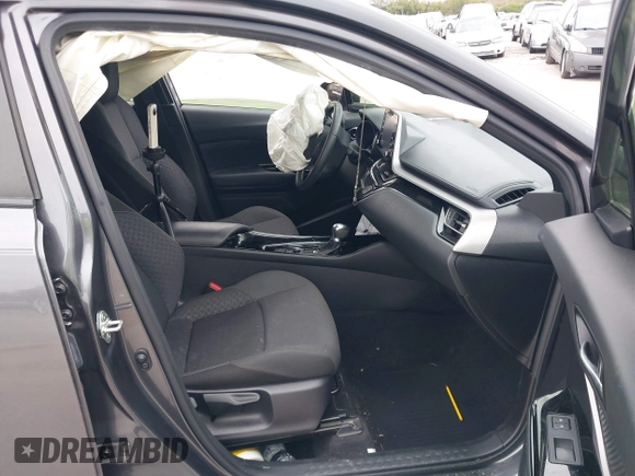 2021 Toyota C-HR LE with VIN JTNKHMBX3M1120177, listed as a IAAI auction lot 41257866 with 43,964 mi miles. Bid and sale history available at carsss.com. Image 5.