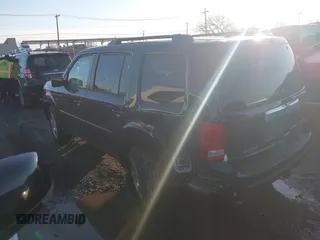2009 Honda Pilot EX-L with VIN 5FNYF48659B012032, listed as a IAAI auction lot 41801232 with 205,636 mi miles and . Bid and sale history available at carsss.com. Image 3.
