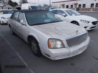 2004 Cadillac DeVille z VIN 1G6KD54Y14U172470, wystawiony jako IAAI lot #41803278 z przebiegiem 115 056 mil mil oraz . Historia ofert i sprzedaży dostępna na DreamBid. Obrazek 1.