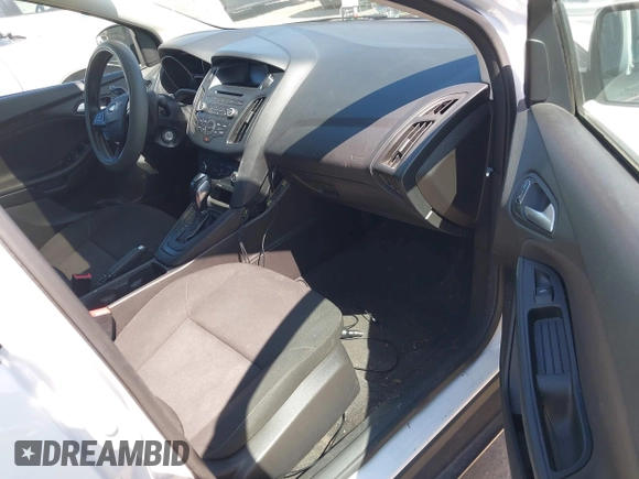 2016 Ford Focus SE with VIN 1FADP3F22GL272491, listed as a IAAI auction lot 42042160 with 140,355 mi miles. Bid and sale history available at carsss.com. Image 5.