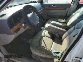 1998 Lincoln Continental with VIN 1LNFM97V5WY637895, listed as a Copart auction lot 77020154 with 0 mi miles and Salvage Title. Bid and sale history available at carsss.com. Image 7.