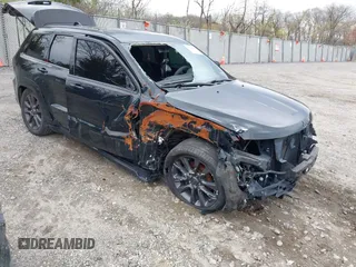 2018 Jeep Grand Cherokee Overland z VIN 1C4RJFCG9JC423188, wystawiony jako IAAI lot #41978012 z przebiegiem 60 163 mil mil oraz . Historia ofert i sprzedaży dostępna na DreamBid. Obrazek 1.