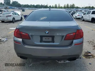 2014 BMW 5 Series 550i xDrive with VIN WBAKP9C51EDZ34830, listed as a Copart auction lot 59906435 with 123,709 mi miles and Salvage title. Bid and sale history available at DreamBid. Image 6.