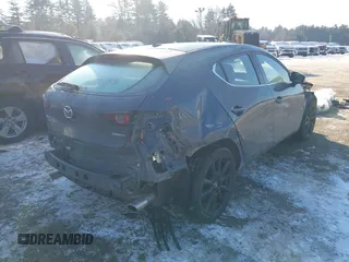 2021 Mazda 3 Premium with VIN JM1BPBML7M1339570, listed as a IAAI auction lot 41394510 with 47,395 mi miles and . Bid and sale history available at DreamBid. Image 4.