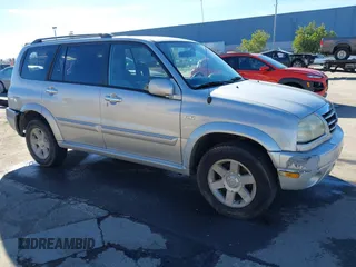 2003 Suzuki XL-7 Touring with VIN JS3TX92V734114162, listed as a IAAI auction lot 41250622 with 227,494 mi miles. Bid and sale history available at carsss.com. Image 1.
