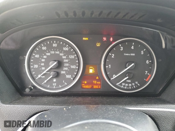 2012 BMW X5 35i z VIN 5UXZV4C5XCL748652, wystawiony jako Copart lot #55457455 z przebiegiem 149 030 mil mil oraz Szkoda całkowita • Salvage title. Historia ofert i sprzedaży dostępna na DreamBid. Obrazek 9.