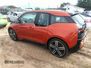 2014 BMW i3 with VIN WBY1Z4C57EV276421, listed as a IAAI auction lot 42667600 with 82,105 mi miles and . Bid and sale history available at DreamBid. Image 3.