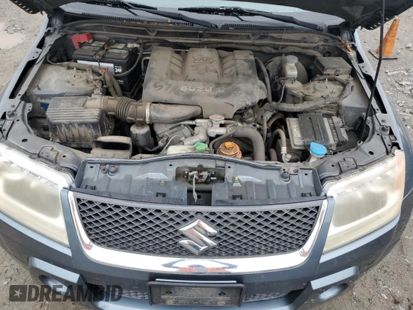 2008 Suzuki Grand Vitara w/Spare & Cargo Covers z VIN JS3TD941484103615, wystawiony jako Copart lot #56634065 z przebiegiem 82 420 mil mil oraz Szkody całkowita. Historia ofert i sprzedaży dostępna na DreamBid. Obrazek 12.