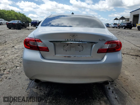 2012 Infiniti M Hybrid with VIN JN1EY1AP0CM910697, listed as a Copart auction lot 60821335 with 145,533 mi miles and Salvage title. Bid and sale history available at DreamBid. Image 6.