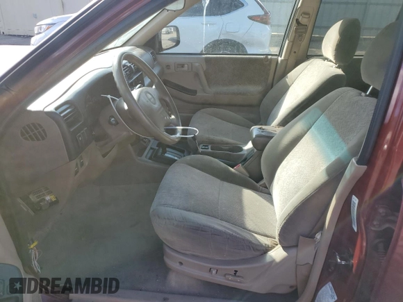 2002 Isuzu Rodeo S with VIN 4S2CK58W324325318, listed as a Copart auction lot 78851294 with 166,323 mi miles and Salvage Title. Bid and sale history available at DreamBid. Image 7.
