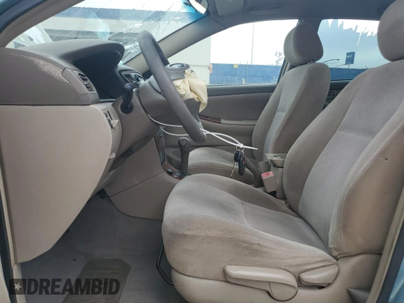 2005 Toyota Corolla CE with VIN 1NXBR32E85Z365739, listed as a Copart auction lot 51977715 with 190,401 mi miles and Salvage Title. Bid and sale history available at DreamBid. Image 7.