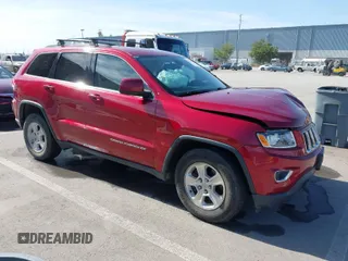 2014 Jeep Grand Cherokee Altitude with VIN 1C4RJFAG4EC262564, listed as a IAAI auction lot 41859505 with 129,186 mi miles. Bid and sale history available at carsss.com. Image 1.