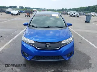 2016 Honda Fit EX z VIN JHMGK5H71GX041650, wystawiony jako IAAI lot #42658304 z przebiegiem 142 904 mil mil oraz . Historia ofert i sprzedaży dostępna na DreamBid. Obrazek 12.