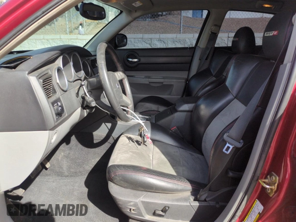 2006 Dodge Charger SRT-8 with VIN 2B3LA73W56H369414, listed as a Copart auction lot 49818765 with 117,563 mi miles and Salvage Title. Bid and sale history available at DreamBid. Image 7.
