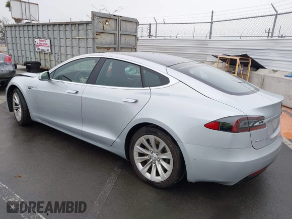 2016 Tesla Model S 70 with VIN 5YJSA1E17GF156514, listed as a IAAI auction lot 41869006 with 17,704 mi miles and . Bid and sale history available at DreamBid. Image 3.