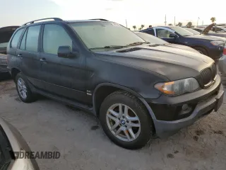 2004 BMW X5 3.0i with VIN 5UXFA13514LU25640, listed as a Copart auction lot 74727494 with 83,061 mi miles and Salvage Title. Bid and sale history available at carsss.com. Image 4.