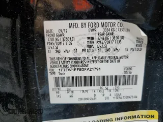 2013 Ford F-150 XL with VIN 1FTFW1EF8DFA21791, listed as a Copart auction lot 61963215 with 128,161 mi miles and Salvage title. Bid and sale history available at DreamBid. Image 12.