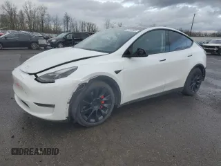2022 Tesla Model Y Performance with VIN 7SAYGDEFXNF455517, listed as a Copart auction lot 44147905 with 32,210 mi miles and Salvage title. Bid and sale history available at DreamBid. Image 1.