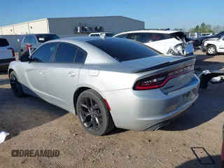 2021 Dodge Charger SXT with VIN 2C3CDXBG0MH562538, listed as a IAAI auction lot 41877128 with 54,934 mi miles and . Bid and sale history available at DreamBid. Image 3.