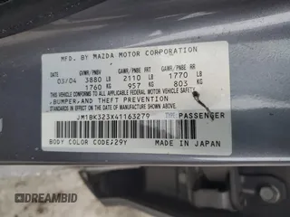 2004 Mazda 3 s with VIN JM1BK323X41163279, listed as a Copart auction lot 88756245 with 163,862 mi miles and Salvage Title. Bid and sale history available at DreamBid. Image 14.