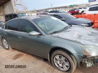 2006 Nissan Altima 2.5 with VIN 1N4AL11D66N351757, listed as a IAAI auction lot 41709864 with 189,486 mi miles. Bid and sale history available at carsss.com. Image 14.