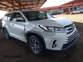 2018 Toyota Highlander SE with VIN 5TDKZRFH0JS549924, listed as a IAAI auction lot 42021534 with 116,313 mi miles and . Bid and sale history available at DreamBid. Image 1.