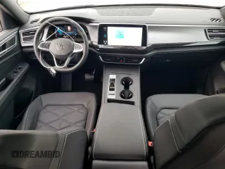 2024 Volkswagen Atlas SE с VIN 1V2DE2CA0RC244941, выставлен на аукционе Copart как лот 84553054 с пробегом 9 миль миль и Списание • Salvage title. История ставок и продаж доступна на DreamBid. Изображение 8.