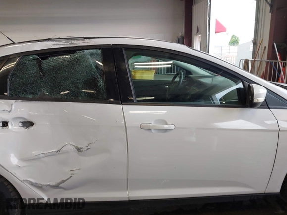 2016 Ford Focus SE with VIN 1FADP3F28GL380663, listed as a IAAI auction lot 42601266 with 78,204 mi miles and . Bid and sale history available at DreamBid. Image 13.