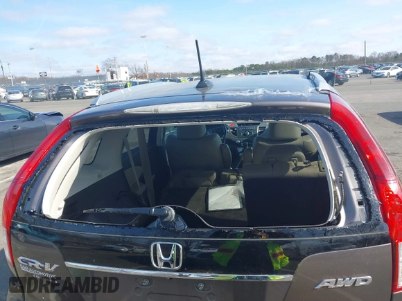 2014 Honda CR-V EX-L with VIN 2HKRM4H75EH718660, listed as a IAAI auction lot 41777405 with 82,956 mi miles. Bid and sale history available at carsss.com. Image 6.