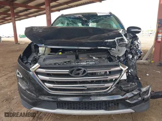 2017 Hyundai Tucson Value with VIN KM8J33A22HU316495, listed as a IAAI auction lot 41896507 with 82,517 mi miles. Bid and sale history available at carsss.com. Image 12.