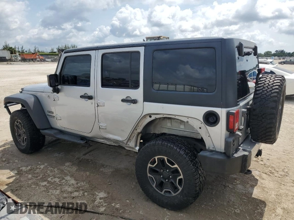 2012 Jeep Wrangler Unlimited Sport z VIN 1C4BJWDG8CL220960, wystawiony jako Copart lot #57823315 z przebiegiem 177 541 mil mil oraz Szkoda całkowita • Salvage title. Historia ofert i sprzedaży dostępna na DreamBid. Obrazek 2.