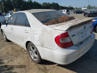 2002 Toyota Camry XLE z VIN JTDBF30K820027492, wystawiony jako IAAI lot #42158162 z przebiegiem 224 291 mil mil oraz . Historia ofert i sprzedaży dostępna na DreamBid. Obrazek 3.