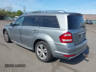 2011 Mercedes-Benz GL-Class GL 450 with VIN 4JGBF7BE3BA740269, listed as a IAAI auction lot 42098338 with 146,055 mi miles. Bid and sale history available at carsss.com. Image 3.