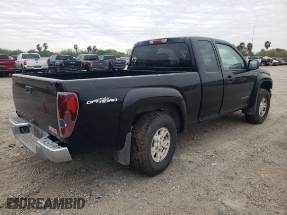 2005 GMC Canyon SLE Z71 with VIN 1GTDS196X58242957, listed as a Copart auction lot 87728635 with 206,977 mi miles and Salvage Title. Bid and sale history available at carsss.com. Image 3.