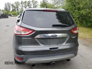 2015 Ford Escape Titanium with VIN 1FMCU9J93FUA67563, listed as a Copart auction lot 61770085 with 134,201 mi miles and Salvage title. Bid and sale history available at DreamBid. Image 6.