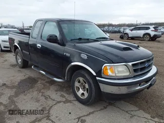1997 Ford F-150 with VIN 2FTDX1720VCA73590, listed as a IAAI auction lot 41956713 with 128,220 mi miles and . Bid and sale history available at DreamBid. Image 1.