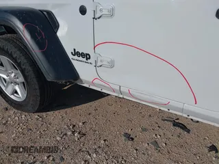 2023 Jeep Gladiator Sport S с VIN 1C6HJTAG0PL533933, выставлен на аукционе IAAI как лот 42351470 с пробегом 57 982 миль миль и . История ставок и продаж доступна на DreamBid. Изображение 17.