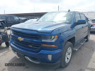 2017 Chevrolet Silverado 1500 LT with VIN 3GCUKREC8HG462719, listed as a IAAI auction lot 41940176 with 380,676 mi miles and . Bid and sale history available at DreamBid. Image 17.