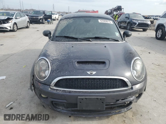 2014 MINI Coupe S z VIN WMWSX3C59ET773064, wystawiony jako Copart lot #42989015 z przebiegiem 135 005 mil mil oraz Szkoda całkowita • Salvage title. Historia ofert i sprzedaży dostępna na DreamBid. Obrazek 5.