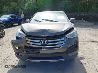 2014 Hyundai Santa Fe with VIN 5XYZTDLB2EG143925, listed as a IAAI auction lot 42243761 with 126,058 mi miles and . Bid and sale history available at DreamBid. Image 12.