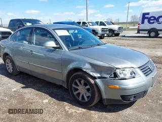 2004 Volkswagen Passat GLS z VIN WVWPD63B04E229578, wystawiony jako IAAI lot #41994869 z przebiegiem 136 746 mil mil oraz . Historia ofert i sprzedaży dostępna na DreamBid. Obrazek 6.
