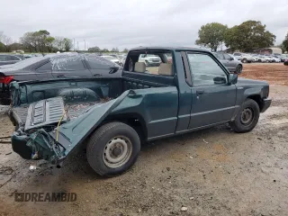 1993 Mitsubishi Mighty Max z VIN JA7LS21G6PP003529, wystawiony jako Copart lot #81342224 z przebiegiem 313 363 mil mil oraz Szkody całkowita. Historia ofert i sprzedaży dostępna na DreamBid. Obrazek 3.