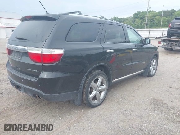 2013 Dodge Durango Citadel with VIN 1C4SDJET3DC563618, listed as a IAAI auction lot 42828144 with 202,648 mi miles and . Bid and sale history available at DreamBid. Image 4.
