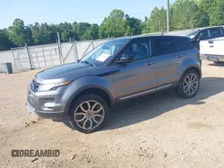 2015 Land Rover Range Rover Evoque Pure Plus z VIN SALVP2BG8FH047528, wystawiony jako IAAI lot #42466907 z przebiegiem 100 941 mil mil oraz . Historia ofert i sprzedaży dostępna na DreamBid. Obrazek 2.