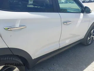 2016 Hyundai Tucson Eco with VIN KM8J3CA22GU076489, listed as a IAAI auction lot 42169732 with 153,597 mi miles. Bid and sale history available at carsss.com. Image 6.
